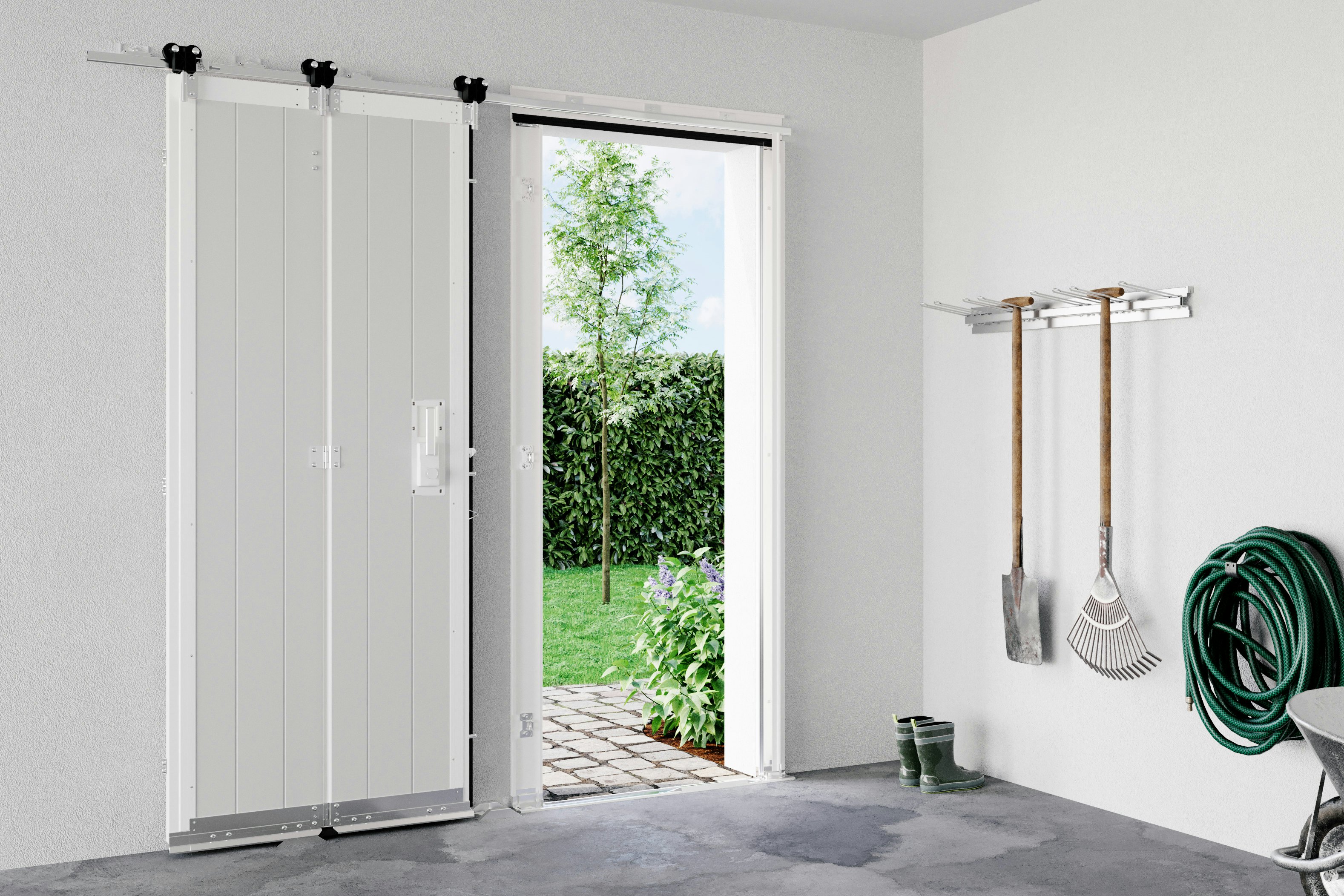 The sliding door variant with a new minimum width of 730 mm offers a practical alternative to the swing door and enables more efficient use of garages with limited space. Garage interior view of the open side sliding sectional door
