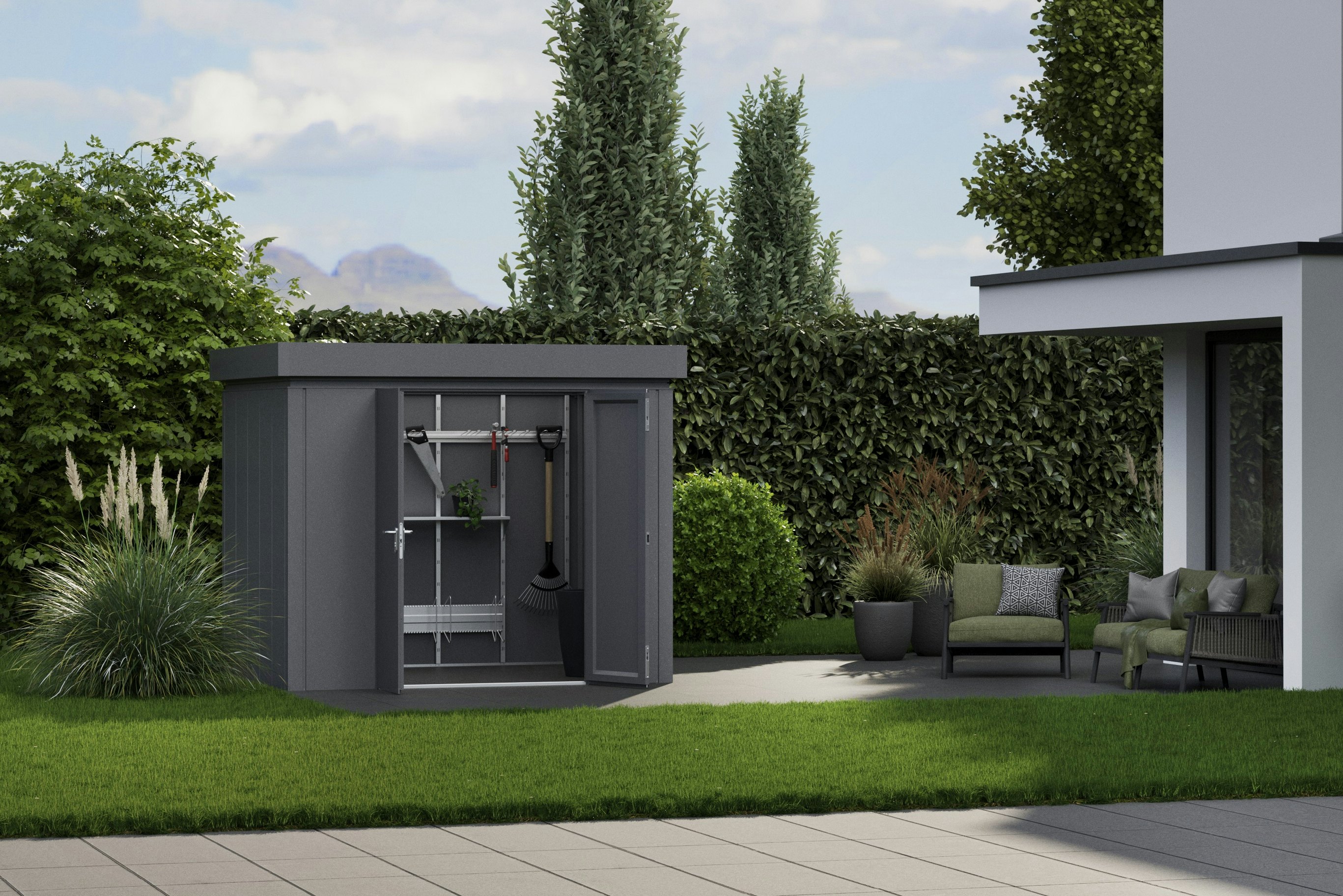 The Juno tool shed can be optimally used with matching accessories for the inside and outside. White house with a garden and grey tool shed