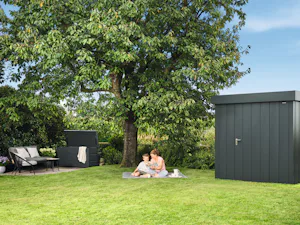 Our campaign products:
Garage doorsEntrance and side... Woman sitting with a child in the garden reading a book