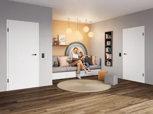 Your home is where you create the most cherished memories... Father sits with his son in the children's room and reads a book