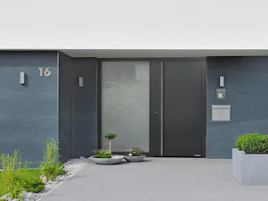 Avantajele dumneavoastră dintr-o privire:
Aspect plin al... Casă modernă cu ușă de intrare în locuință ThermoPlan Hybrid, gri