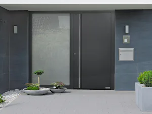Ihre Vorteile im Überblick:
Vollflächige Türansicht und... Modernes Einfamilienhaus mit ThermoPlan Hybrid Haustür in Grau