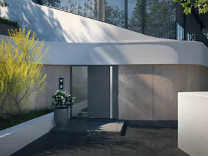 Ihre Vorteile im Überblick:
Hightech-Flügelprofil aus... Modernes Haus mit geschwungener Fassade und grauer ThermoCarbon Haustür