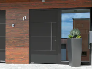 Ihre Vorteile im Überblick:
Serienmäßig RC 4 (ohne... Graue ThermoSafe Hybrid Haustür mit großem Seitenteil aus Glas