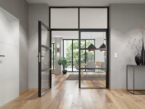 Door de combinatie van glas en staal kunnen ruimtes met de... Door de combinatie van glas en staal kunnen ruimtes met de loftdeuren van Hörmann tegelijkertijd worden geopend en van elkaar worden gescheiden. Bovendien zorgen de deuren voor een natuurlijke...
