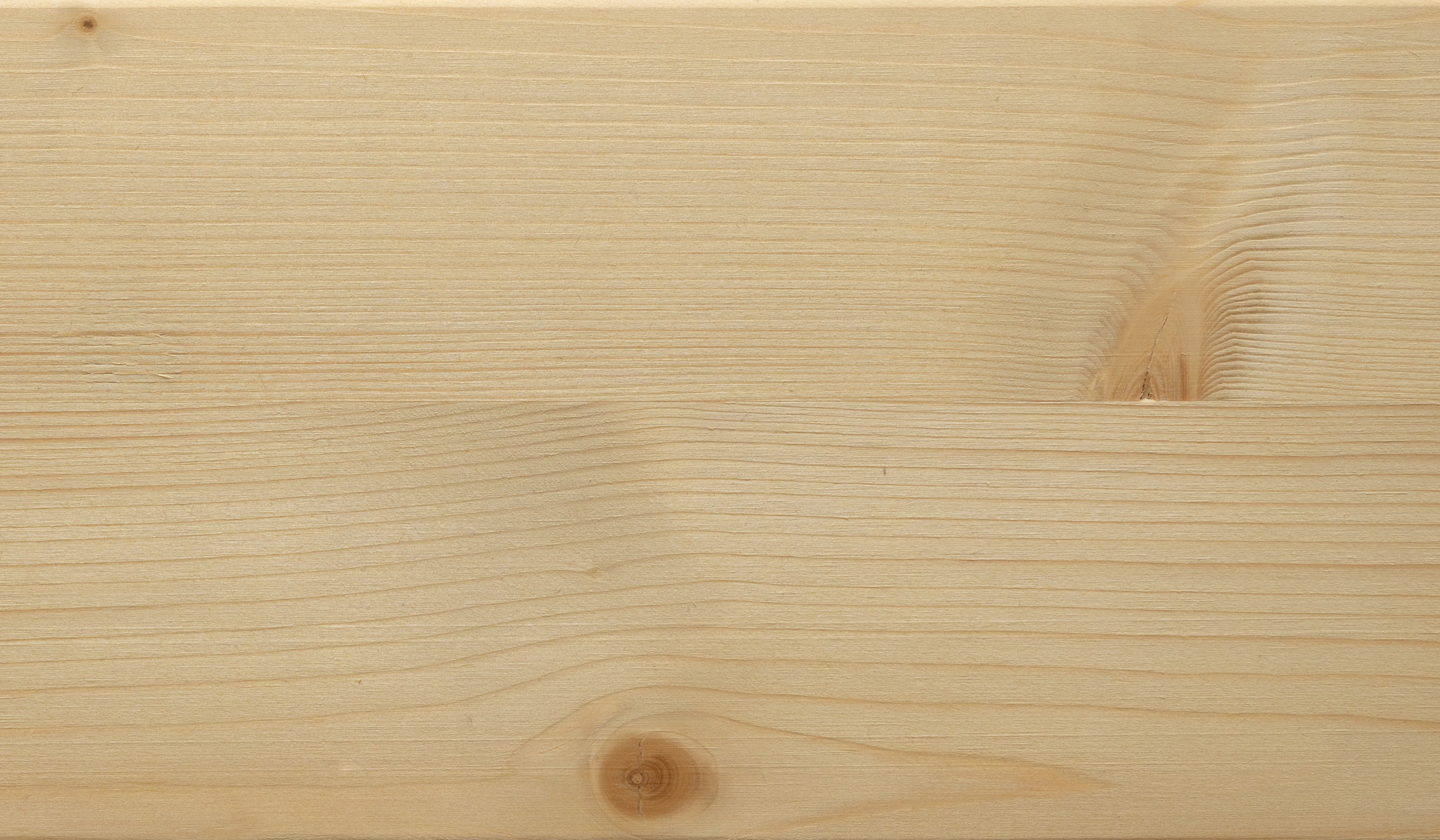 Die Sektionaltore aus Massivholz erhalten Sie mit einer Exklusiv-Holzverkleidung in Nordischer Fichte in 8 verschiedenen Farbtönen.