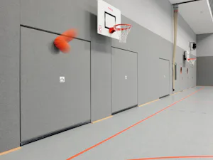 Vrata za športne dvorane Hörmann so zasnovana v skladu z... Vrata za športne dvorane Hörmann so zasnovana v skladu z veljavnimi varnostnimi standardi za uporabo v šolskih in športnih objektih. Vratno krilo je preizkušeno glede odpornosti proti udarcem žoge po...