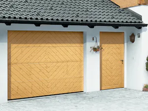 Zijdeuren zijn praktisch, wanneer snel voorwerpen uit de... Zijdeuren zijn praktisch, wanneer snel voorwerpen uit de garage moeten worden gehaald zonder de garagedeur te willen openen. Of wanneer een tweede auto vanwege een korte oprit vlak vóór de garagedeur...