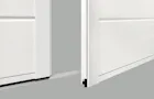 Hinged garage door frame cut-out Hinged garage door frame cut-out
