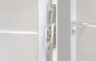 Detail view hinged garage door locking Detail view hinged garage door locking