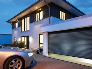 Roller garage door RollMatic Opening vertically and requiring minimum space inside the garage. The roller garage door design provides maximum space inside and in front of the garage. While the ceiling of the garage can remain...