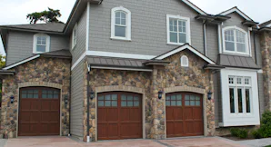 Infinity Classic 7800 The elegant charm of a classic wooden carriage house style door meets durable, maintenance-free construction. Our latest manufacturing technology combines a modern, aluminum garage door with the...