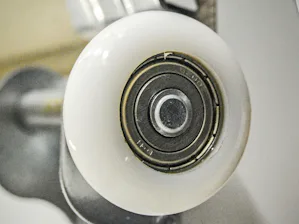 White 11 Ball Bearing Nylon Rollers Hörmann nylon rollers feature 11 pre-lubed ball bearings encased in a high strength steel casing that provides a quiet ride and years of reliable service