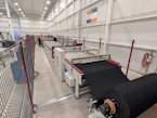 3. Advanced Rubber Curtain Assembly
The Technology:A... 3. Advanced Rubber Curtain Assembly
The Technology:A custom-built curtain assembly system allows workers to fabricate curtains at ergonomic standing height rather than kneeling on the floor....