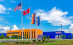 Inside Hörmann Sparta: North America's Home for Innovation Hormann North America Headquarters Entrance with Flags
