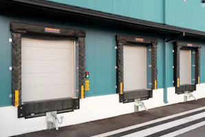 Manufacturing
Most manufacturing facilities share the same... Row of four loading docks with dock seals and trailer restraints