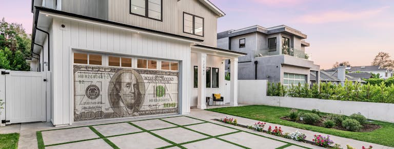 Garage door with $100 bill design